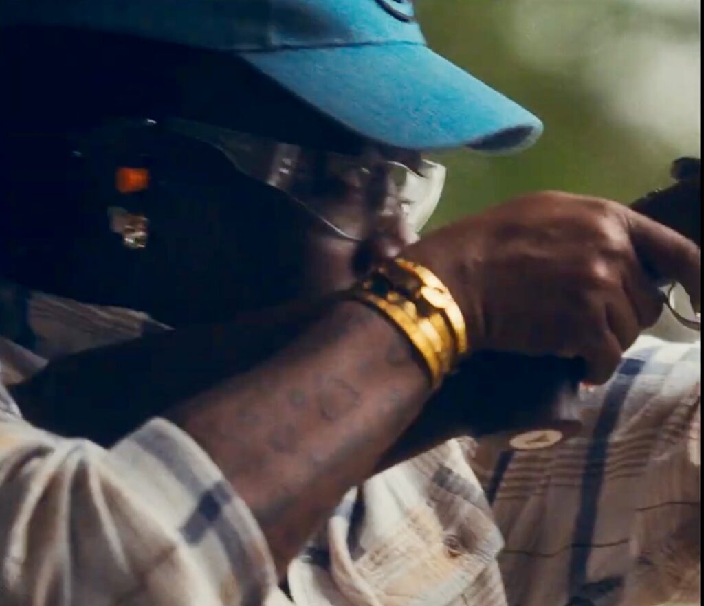 A participant taking aim during a sporting clays outing
