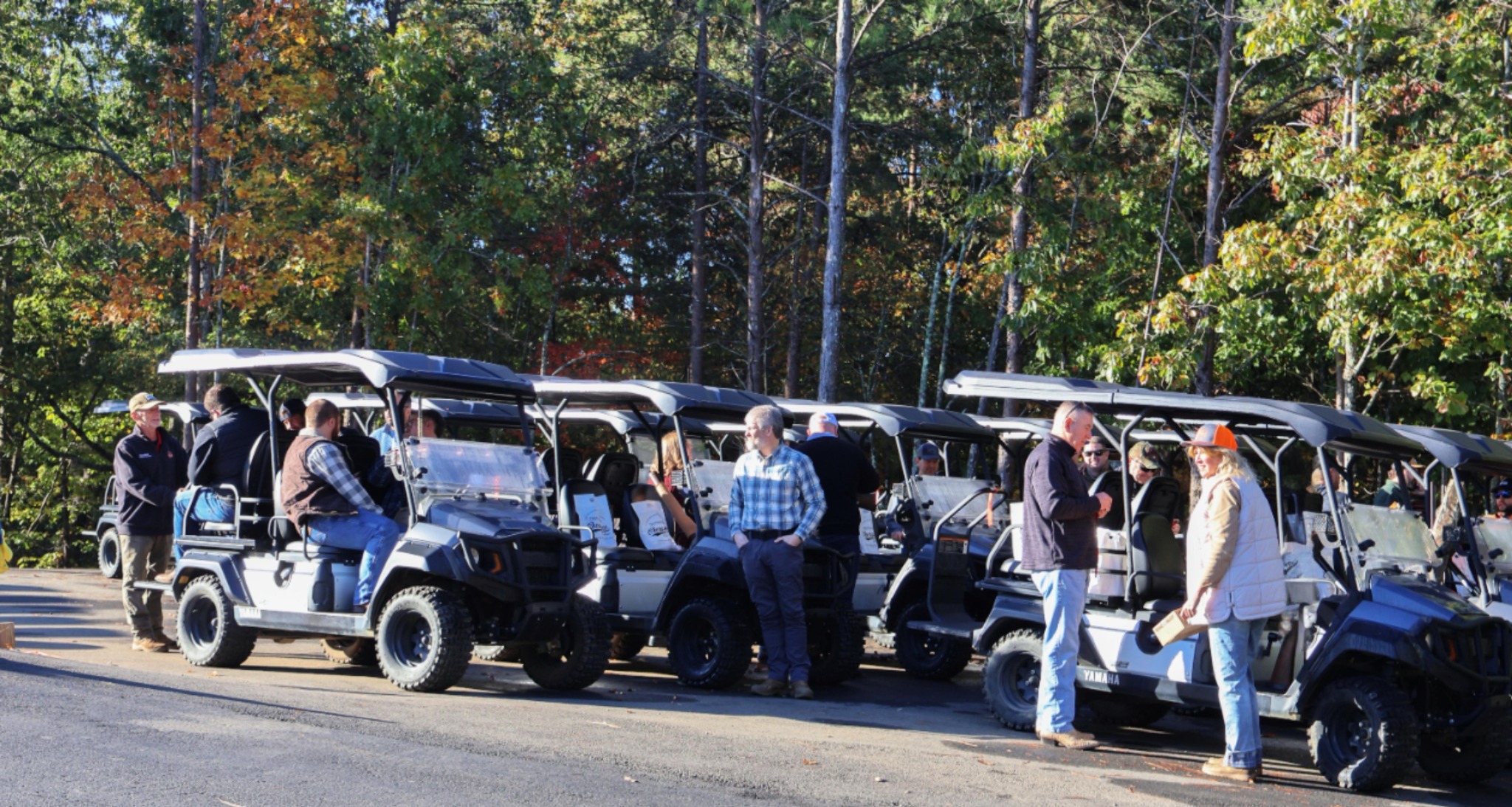 Guests getting ready for their group outing in Yamaha carts at Garland Mountain