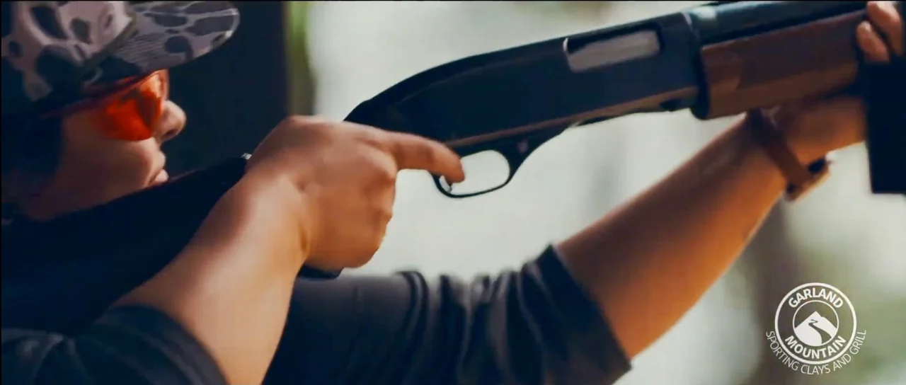 Shooter wearing orange safety glasses at Garland Mountain